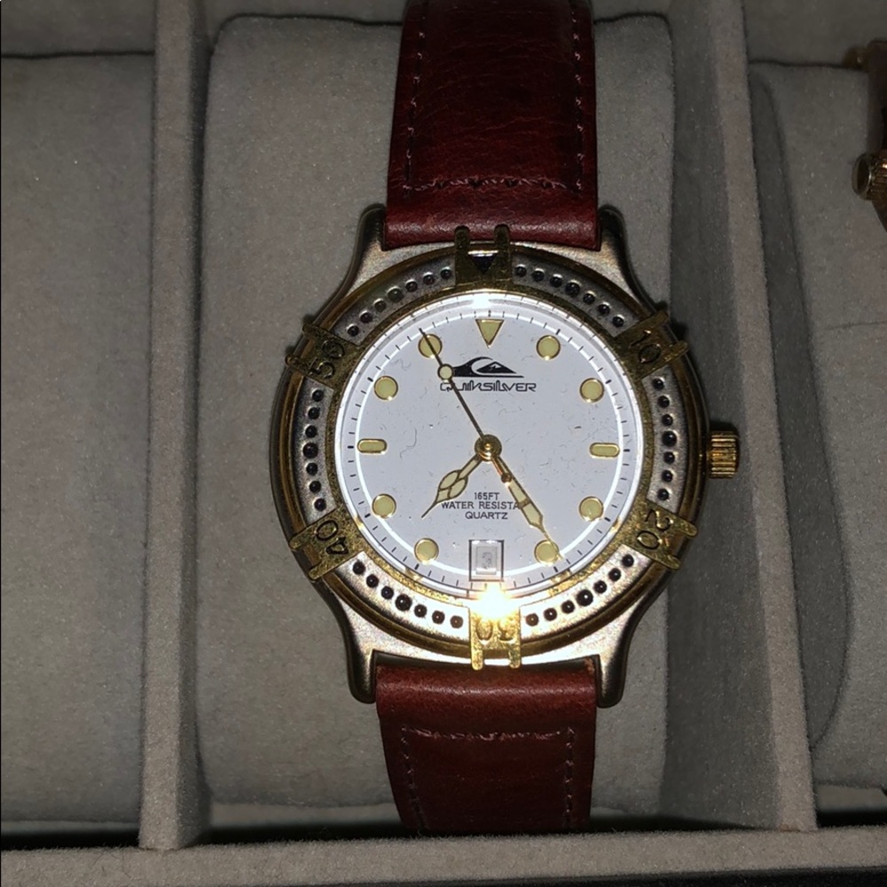 Quick Silver Gold trim watch with genuine leather